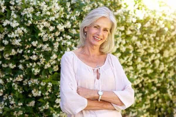 Older woman happy with urinary incontinence treatment Oldham