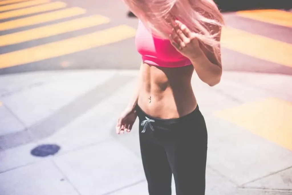 Woman with toned stomach after LA-EMS Body Sculpting Treatment Oldham